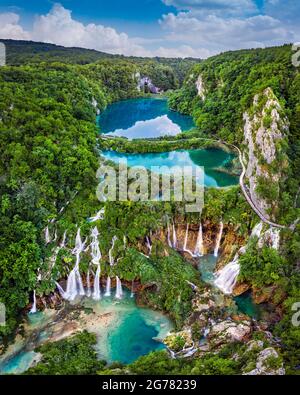 Plitvice, Croatia - Amazing view of the beautiful waterfalls of Plitvice Lakes in Plitvice National Park on a bright summer day with blue sky and clou Stock Photo