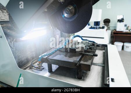 Laboratory test equipment for testing metal and iron samples in metallurgical plant lab. Stock Photo