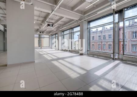 Modern white empty room interior with columns and panoramic windows.  room for office or store Stock Photo