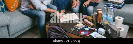 Father explaining to his family the emergency assembly point Stock Photo