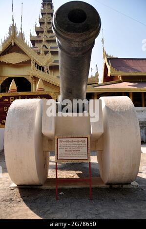 Ancient Cannon or ruins artillery gun at front of Mandalay Palace the last Burmese monarchy for Burmese people and foreign travelers travel visit on F Stock Photo