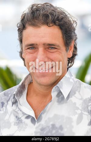 Palais des festivals, Cannes, France. 12th July, 2021. Adriano Giannini poses at the 'Three Floors' Photocall. Picture by Credit: Julie Edwards/Alamy Live News Stock Photo