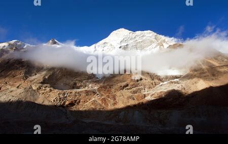 Mount Makalu with clouds, Nepal Himalayas mountains, Barun valley, evening view Stock Photo