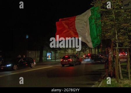 Milan,Italy july 11 2021-  Italian fans celebrate the victory of the Euro 2020 football championship after beating England in the final Credit: Christian Santi/Alamy Live News