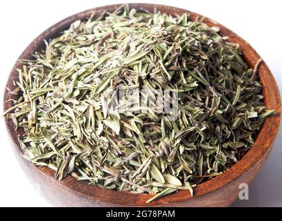 Dried organic thyme in bowl.On white background Stock Photo