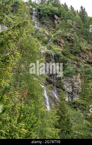 Europe, Austria, Tyrol, Ötztal Alps, Ötztal, Längenfeld, small waterfall in the mountain forest Stock Photo