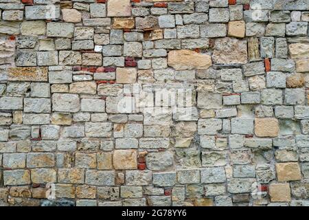 multi textured stone wall, background. Stock Photo