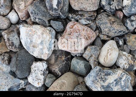 top view of pebbles or stones on beach, full-frame nature background Stock Photo