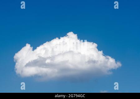 One single cumulus cloud in the blue sky, natural background or wallpaper  Stock Photo - Alamy