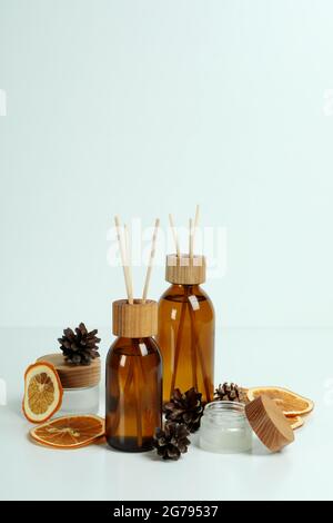 Diffusers, lemons and cones on white background Stock Photo