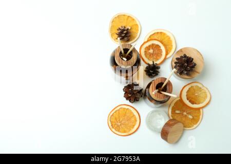 Diffusers, lemons and cones on white background Stock Photo