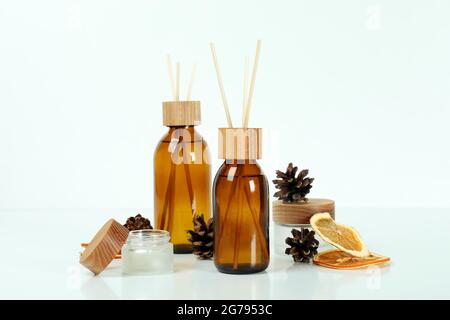 Diffusers, lemons and cones on white background Stock Photo