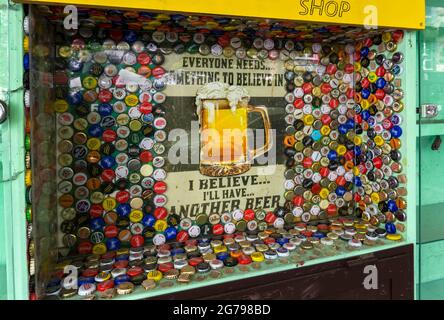 old beer advertisement on a shop window,Sofia,Bulgaria; Stock Photo