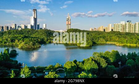 Guiyang. 7th July, 2021. Aerial photo taken on July 7, 2021 shows the scenery of Guanshanhu Park in Guiyang City, southwest China's Guizhou Province. Credit: Yang Wenbin/Xinhua/Alamy Live News Stock Photo