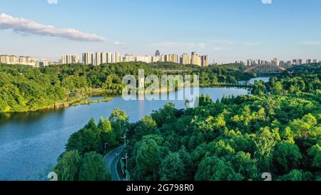 Guiyang. 7th July, 2021. Aerial photo taken on July 7, 2021 shows the scenery of Guanshanhu Park in Guiyang City, southwest China's Guizhou Province. Credit: Yang Wenbin/Xinhua/Alamy Live News Stock Photo