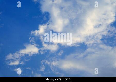 White Clouds Floating on Blue Sky Stock Photo