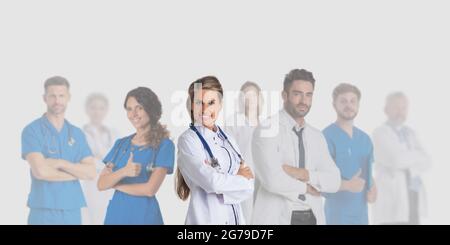 Team portrait of medical workers, doctors, nurses on gray background Stock Photo
