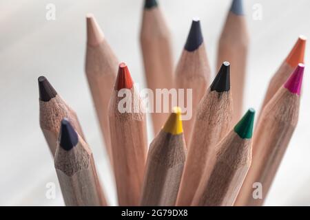 Close up of colored pencils for drawing on blurred background Stock Photo