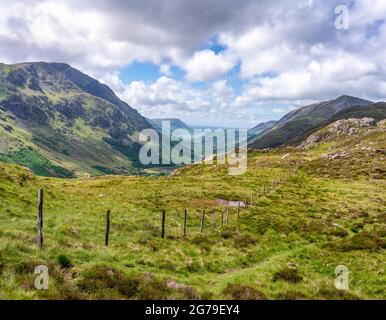 Looking down into Ennerdale along to High Stile and across to Pillar from the flanks of Hay Stacks in the English Lake District UK Stock Photo