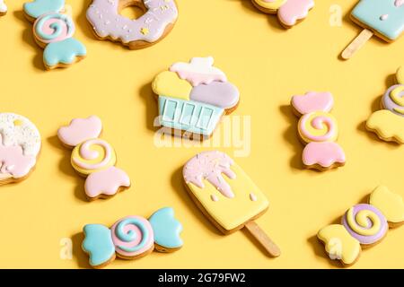 Colorful gingerbread cookies in the form of sweets and ice cream in glaze. Stock Photo