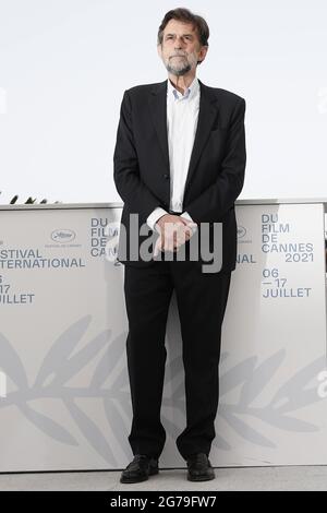 Cannes. 12th July, 2021. Director Nanni Moretti poses during the photocall for the film 'Tre Piani' (Three Floors) at the 74th annual Cannes Film Festival, in Cannes, France, July 12, 2021. Credit: Xinhua/Alamy Live News Stock Photo