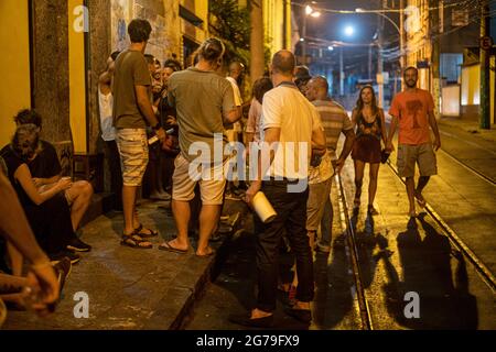 Authentic Party with the locals in the Streets and bars of Santa Teresa, Rio de Janeiro, Brazil at a warm summernight. Shot with Leica M10 Stock Photo