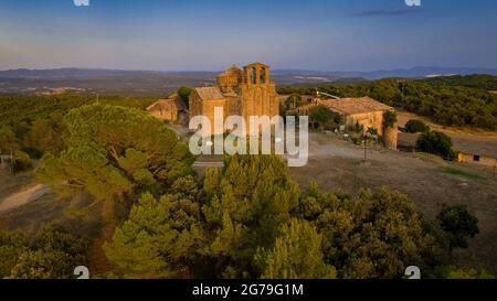 Aerial view of the romanesque church of Sant Cugat del Racó at sunset (Navàs, Barcelona, Catalonia, Spain) ESP: Vista aérea de Sant Cugat del Racó Stock Photo