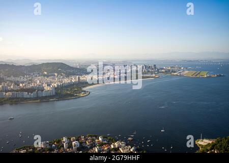 Panoramic view of Rio de Janeiro at sunset as viewed from Sugar Loaf mountain peak. Shot with Leica M10 Stock Photo