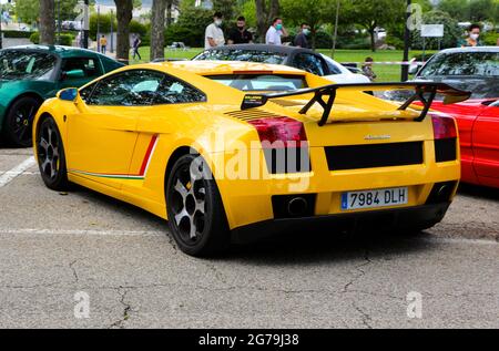 Rear view of a yellow Lamborghini Gallardo road car on display at a Super car day public event parked in Sardinero Santander Cantabria Spain June 2021 Stock Photo