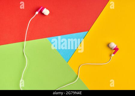 Popular browser logo from paper. Earphones on logo. Audio, multimedia concept. Red, yellow, green and blue colors. Colorful and bright logo Stock Photo