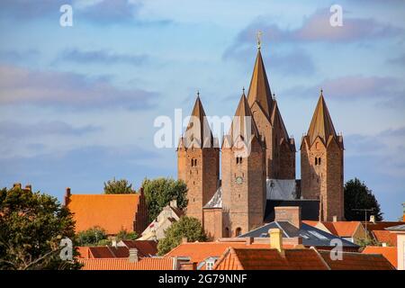 Church of Our Lady in Kalundborg, Denmark. It has five distinctive towers, and stands on a hill above the town, making it the town's landmark. Stock Photo