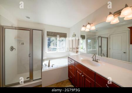 Bathroom interior with large vanity sink and window Stock Photo