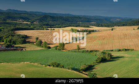 Forests and fields in summer, seen from the viewpoint of the Sant Adjutori hermitage, in Olot, in the Lluçanès region (Barcelona, Catalonia, Spain)