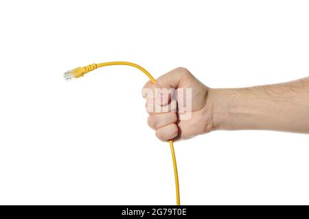 LAN ethernet cable in hand. Yellow RJ45 twisted pair cable for computer network. Cat 5e UTP connection. White isolated background Stock Photo