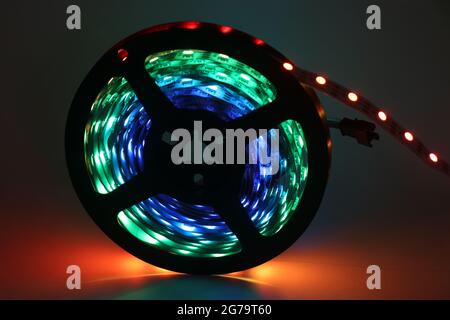 RGB lights or LED strips use to give life to surface of kitchen cabinet or any other boring space of house. Light strip for home improvement Stock Photo