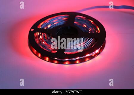Beautiful glow of red light from strip of light emitting diodes Stock Photo