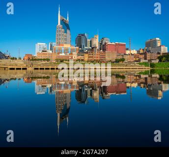 Nashville, Tennessee - 28 June 2021: View of the financial downtown district of Nashville and the Cumberland River Stock Photo