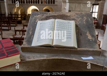 Germany, Saxony-Anhalt, Gernrode, hymn book lies on the pulpit of the collegiate church St. Cyriakus, is one of the most important Ottonian architectural monuments in Germany, Harz Stock Photo