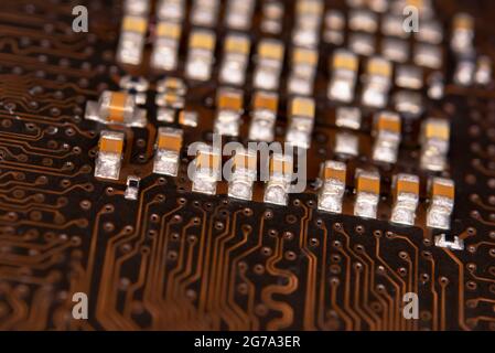 close up ceramic capacitors on electronic circuit board Stock Photo