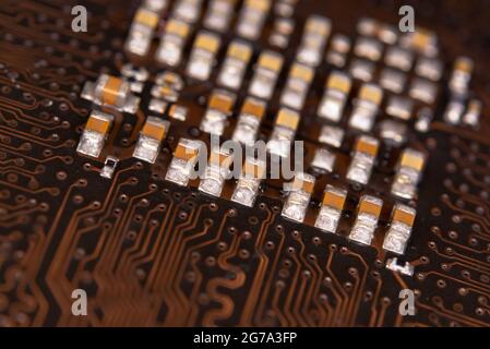 close up ceramic capacitors on electronic circuit board Stock Photo