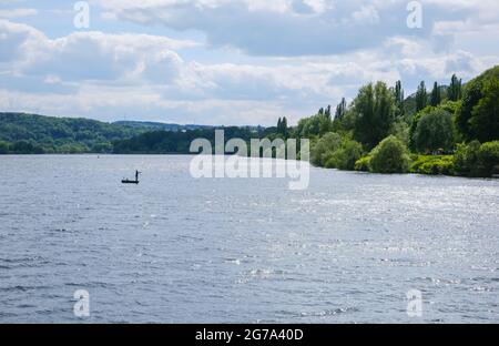 Bochum, North Rhine-Westphalia, Germany - Anglers in the boat on Lake Kemnader. Stock Photo