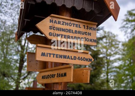 Germany, Saxony-Anhalt, Stolberg, signposts to the Harzhotel and to Mittenwald at the Josephskreuz on the Großer Auerberg in the Harz Mountains Stock Photo