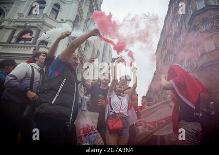 England Fans holding smoke flares ahead of the Euro 2020 Final England vs. Italy Stock Photo