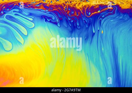 Rainbow colors. Psychedelic multi colored patterns background. Photo macro shot of soap bubbles Stock Photo