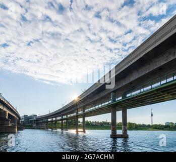 river Donau Danube, bridge Georg-Danzer-Steg with U6-Donaubrücke ...