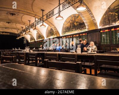 Prague, Czech Republic - July 2 2021: U Fleku Brewery Beer Hall and Restaurant Interior with Guests. Stock Photo