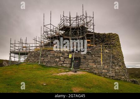 A 3 shot HDR image of Dun Carloway, Charlabhaigh, Broch, undergoing refurbishment of the eastern wall, Carloway, Isle of Lewis, Scotland. 23 June 2021 Stock Photo