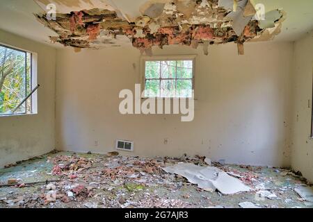 Dirty living room of an old and dilapidated empty house in Washington State Stock Photo
