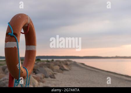 lifebuoy on the beach in Laboe,  Germany. Stock Photo