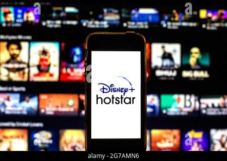 In this photo illustration, a Disney+ Hotstar logo seen displayed on a smartphone. Stock Photo